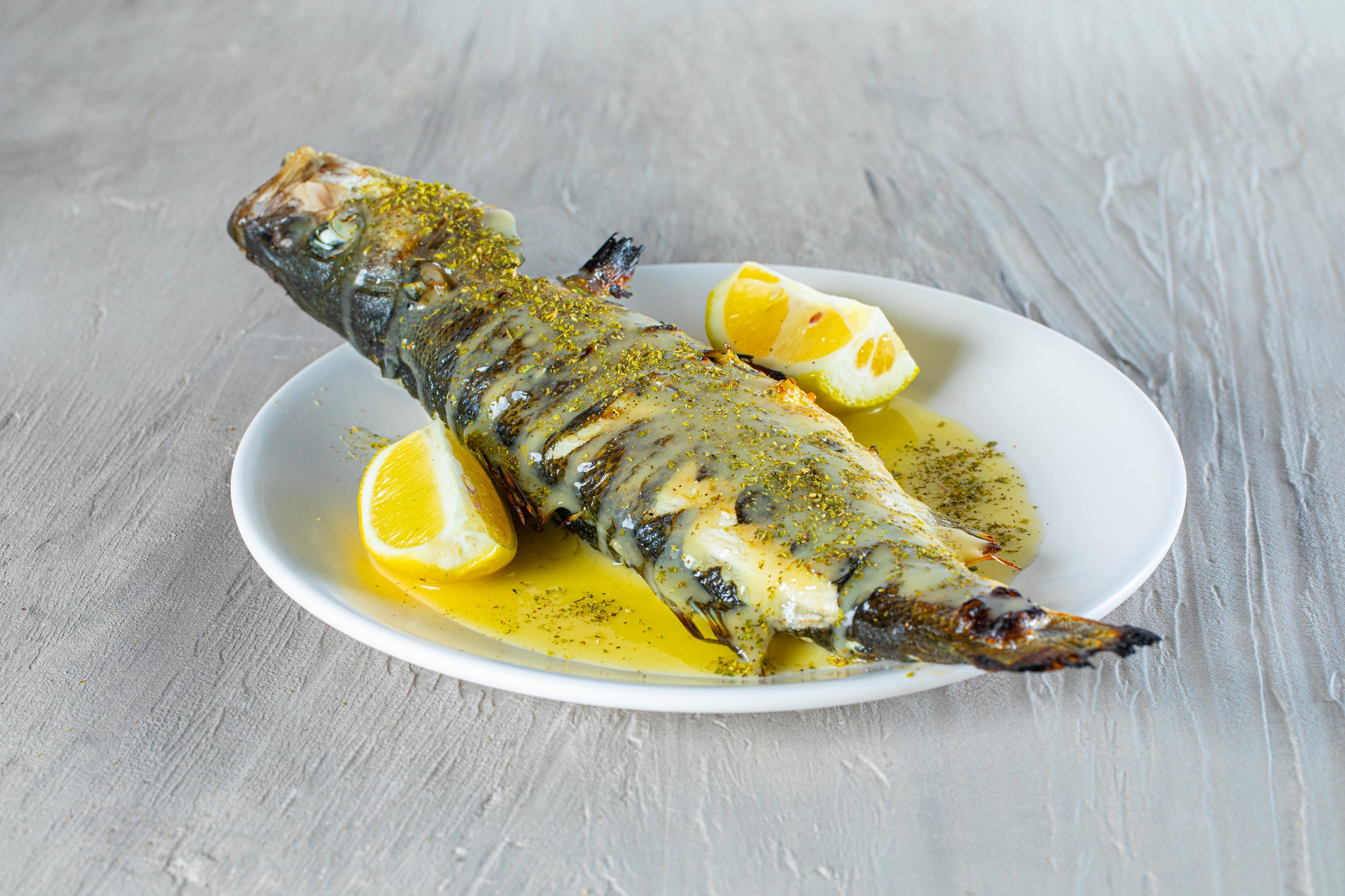 Λαβράκι Σχάρας με Λαδολέμονο & Μυρωδικά